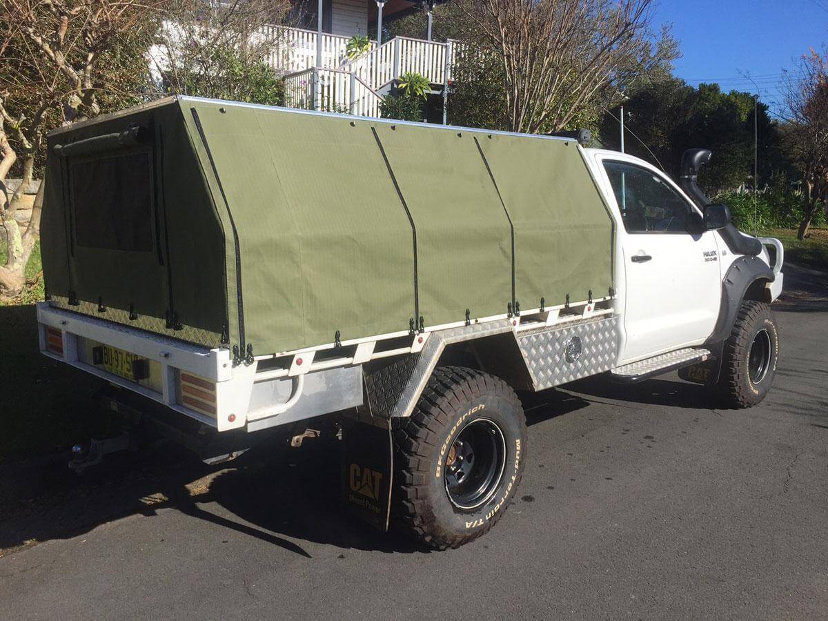 Canvas for Canopy custom solution on a Ute parked outside on a sunny day.