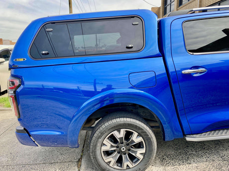 Blue ute with canopy for Ute Canopy Camping adventure.