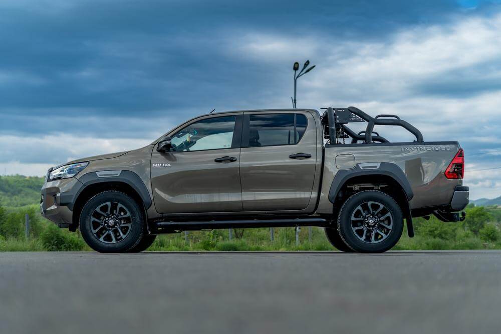 Toyota Accessories on display with a Toyota truck outdoors.