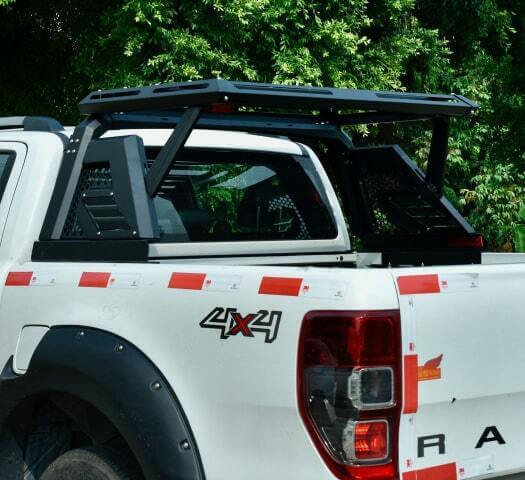 UTE TUB RACKS by UniUte installed on a white 4x4 vehicle, showcasing premium ladder and tradesman racks for versatile uses.