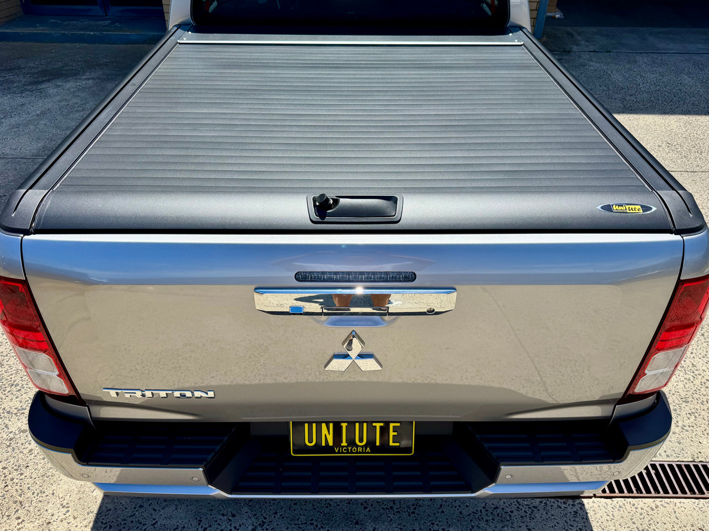 Triton MV 2024+ manual roller shutter — parked outdoor view