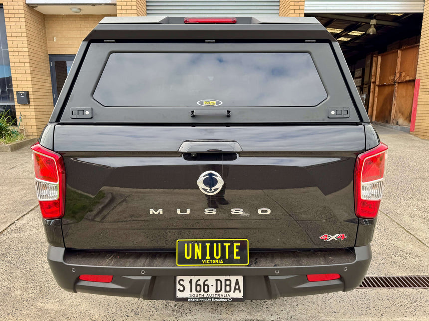Rear view of KGM Musso Canopy XLV (Long Tub) 2018-2025. Stainless steel ute canopy by UniUte. Focus keyword: kgm musso canopy.
