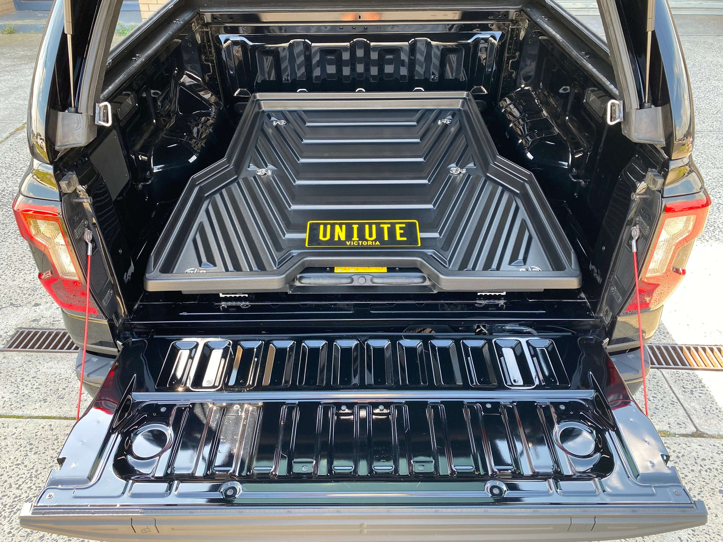 Slide out ute tray for Ford Ranger with UniUte sliding tray drawer for 2012-2025 models, enhancing cargo access and convenience.