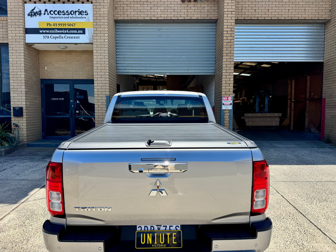 Mitsubishi Triton MV 2024+ roller shutter — available at UniUte Australia