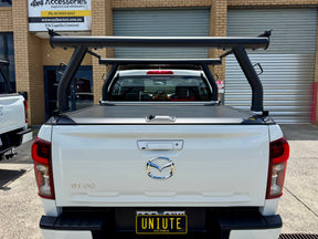 Ladder racks for UniUte roller shutters Gen1 Gen2 — installed on red ute | UniUte
