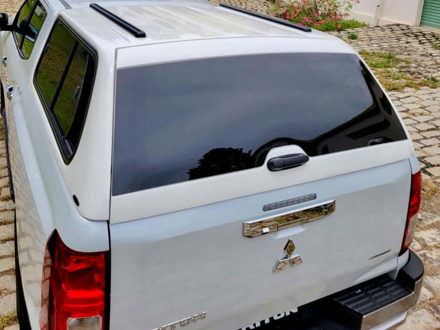 Mitsubishi Triton MV 2024+ equipped with FORCE PRO series triton canopy, designed for durability and adventure.