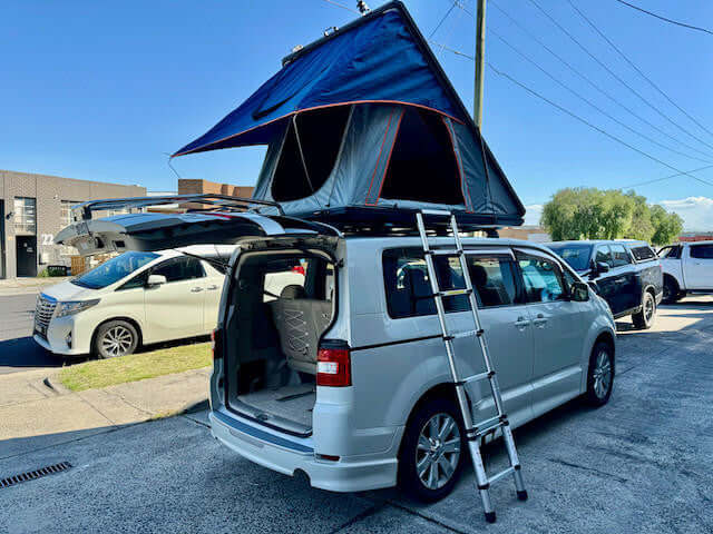 2-person aluminium tent with awning — close-up of hinge and gas strut mechanism