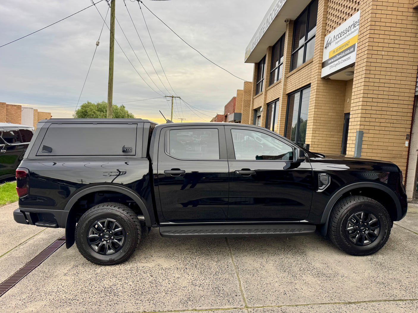 Ford Ranger NextGen canopy — rear door open showing interior tub storage