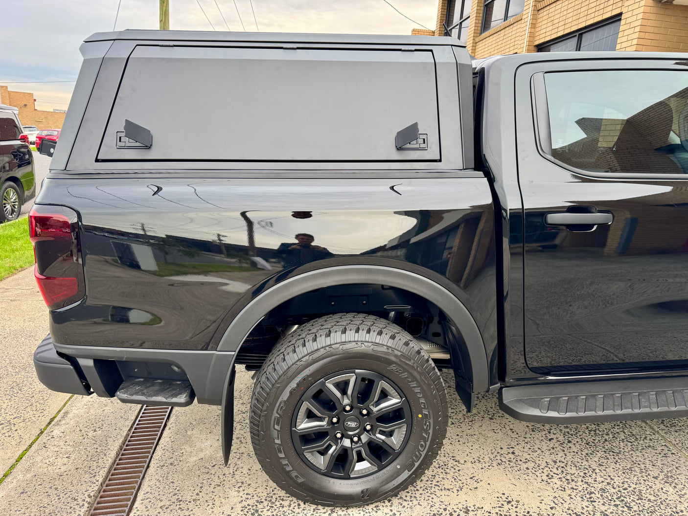 Ranger NextGen stainless steel canopy — lift-up side window open showing ventilation and access