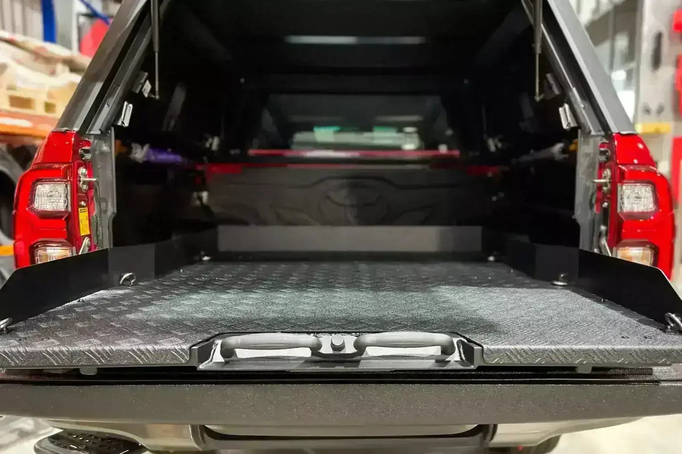 Open cargo tray in Jeep Gladiator 2020-2025 with sliding tray drawer for enhanced vehicle storage