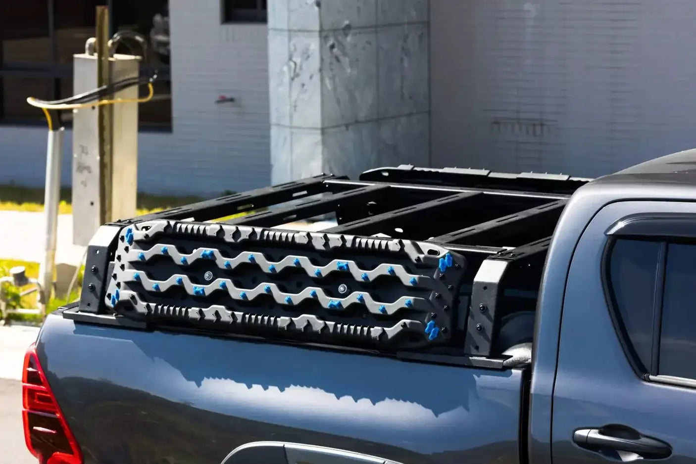 Tub rack universal multifunction utility rack carrier cage on ute for heavy-duty gear transport.