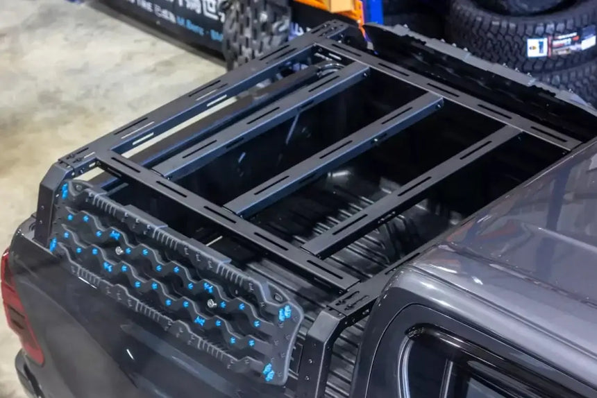 Tub rack utility multifunction carrier cage on a ute for hauling gear securely.
