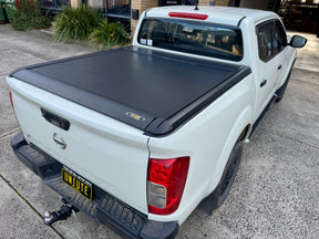 Electric roller shutter for Nissan Navara NP300 2015–2025 — installed closed over the tub | UniUte