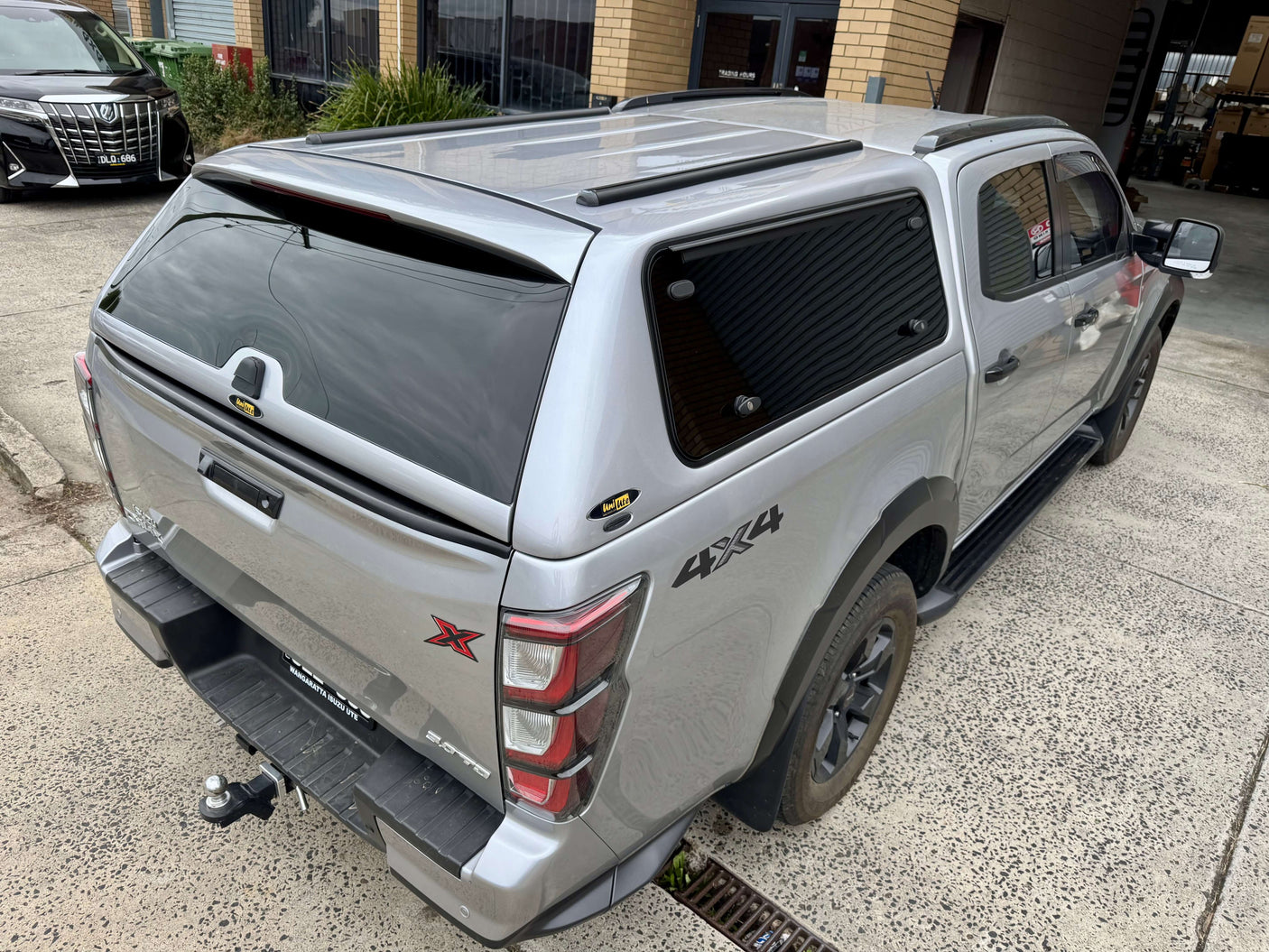 Top view of Canopy DMax 2020-2025 Isuzu FORCE PRO on a parked Isuzu D-Max dual cab