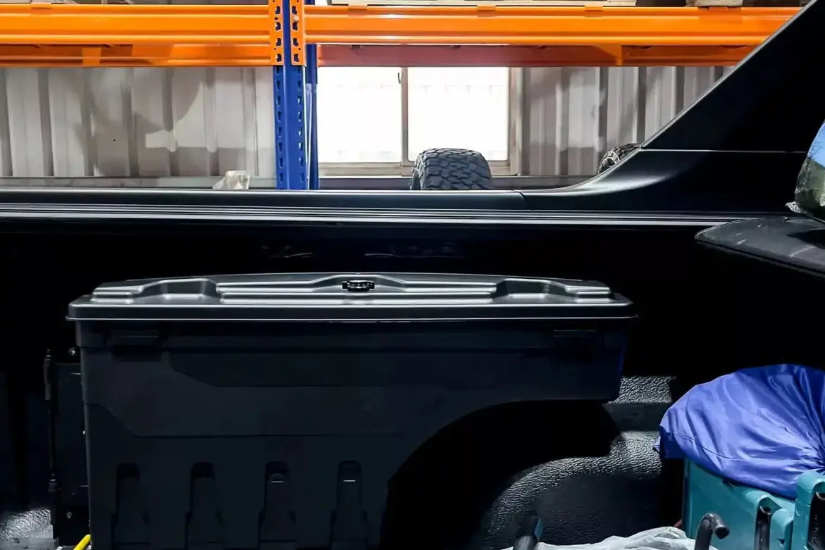 Toyota Hilux tool box 2015-2025 in truck bed, showcasing secure swing-out storage solution for SR5 REVO.