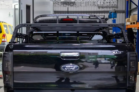 Universal Utility Multifunction tub rack mounted on a black pickup truck, ideal for carrying gear and tools securely