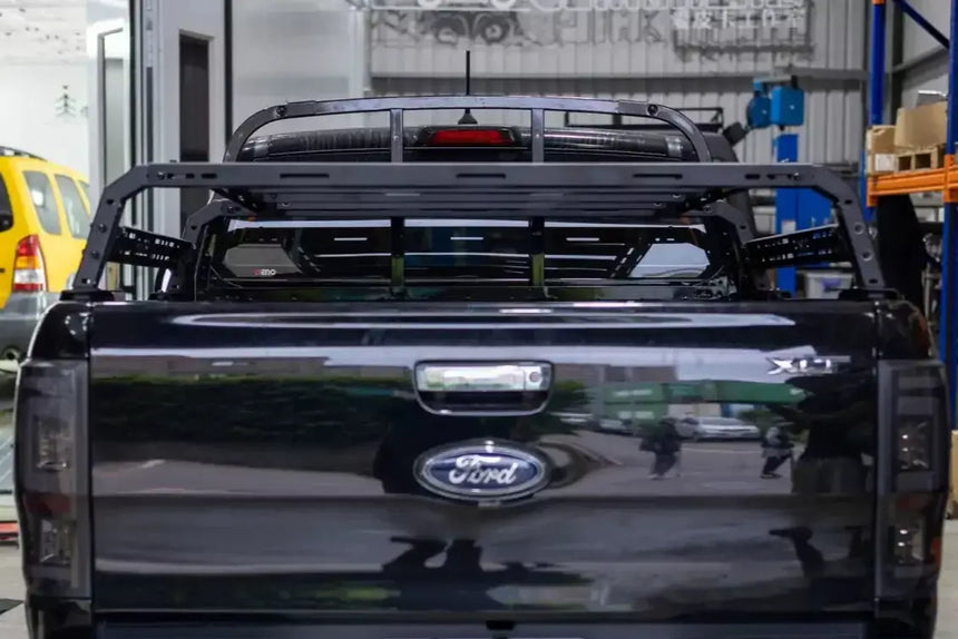 Universal Utility Multifunction tub rack mounted on a black pickup truck, ideal for carrying gear and tools securely