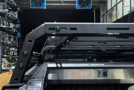 Close-up of a tub rack universal multifunction utility rack carrier cage installed on a vehicle, showcasing its rugged design.