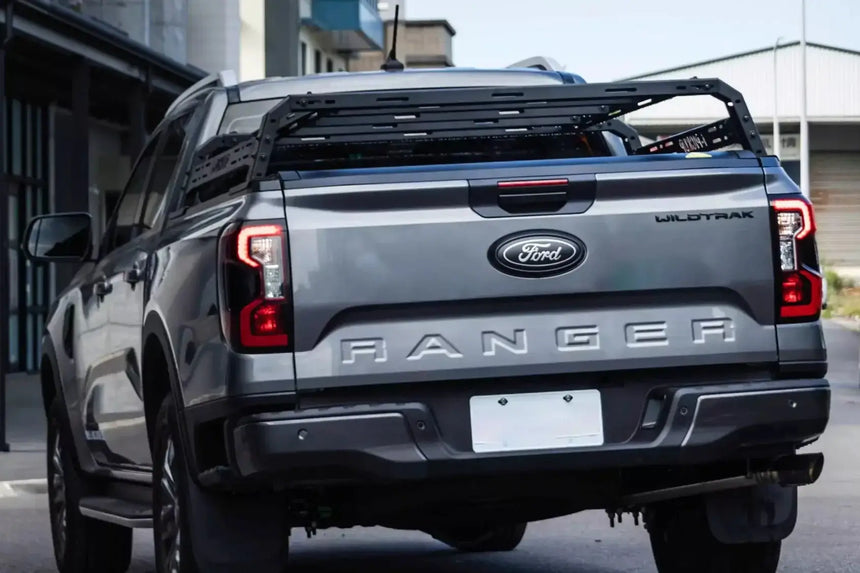 Grey Ford Ranger equipped with a tub rack utility multifunction carrier cage for secure gear transport
