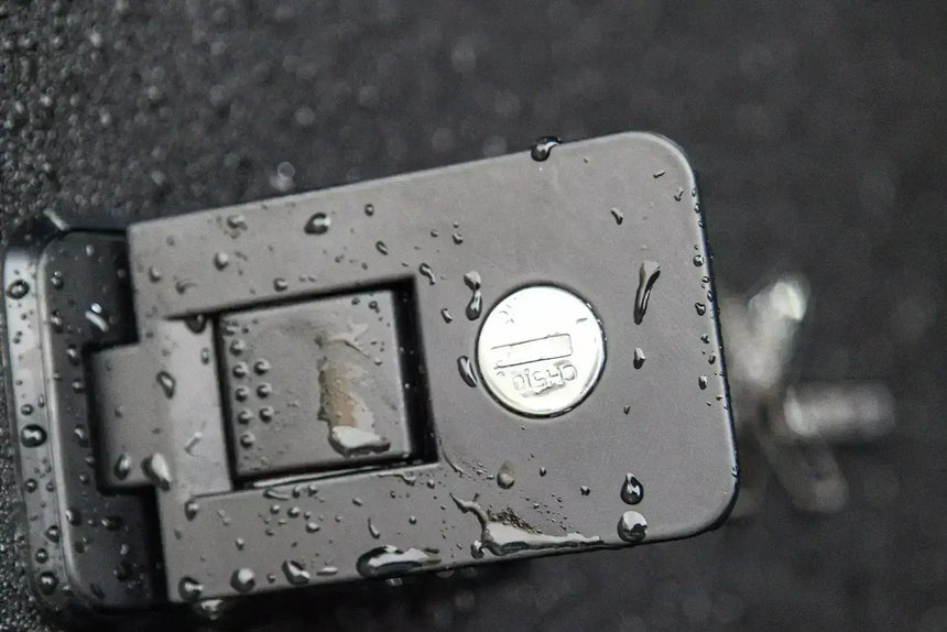 Close-up of lock mechanism on KGM Musso Canopy for SsangYong Musso XLV 2018-2025 showcasing durability in wet conditions.