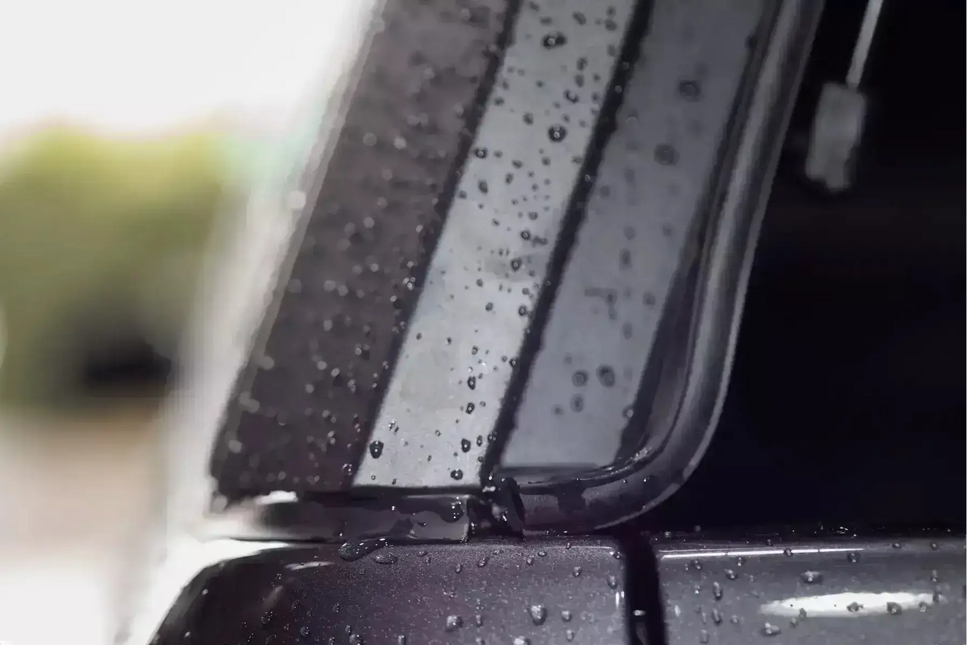 Close-up of KGM Musso Canopy on SsangYong Musso XLV showing stainless steel durability in rainy weather