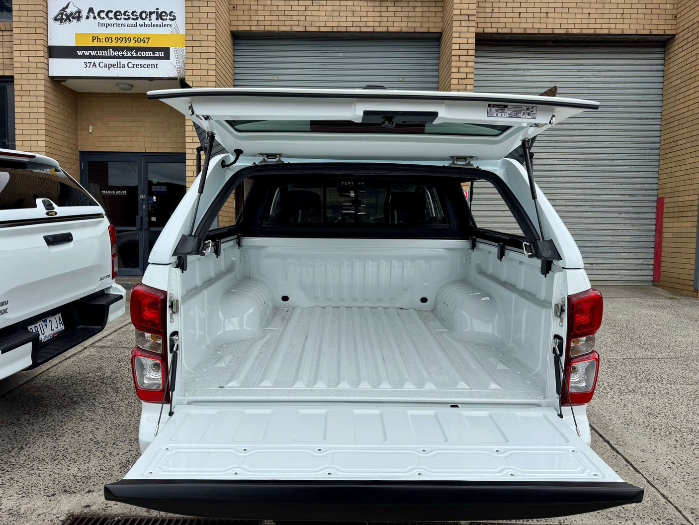 Open view of FORCE PRO Canopy DMax 2020β2025 for Isuzu D-Max, showcasing spacious interior, by UniUte
