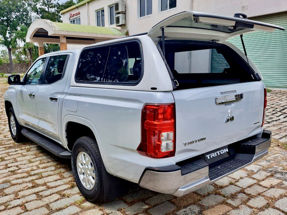 Mitsubishi Triton MV 2024+ with FORCE PRO triton canopy in outdoor setting