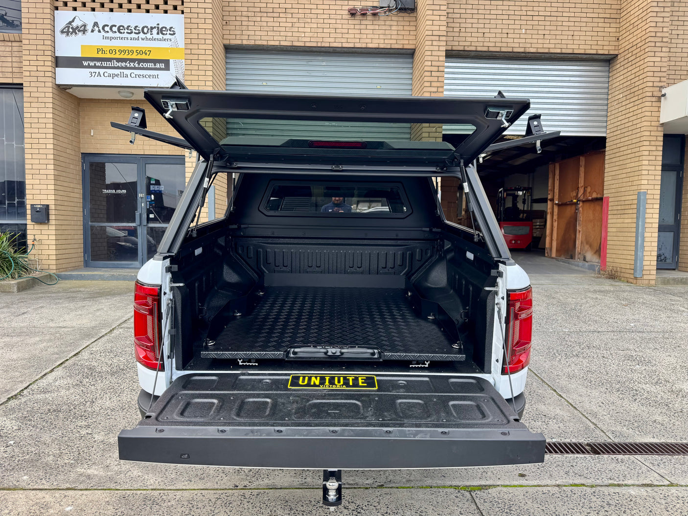 BYD Shark 6 2025+ steel canopy — both gullwing doors open showing full access