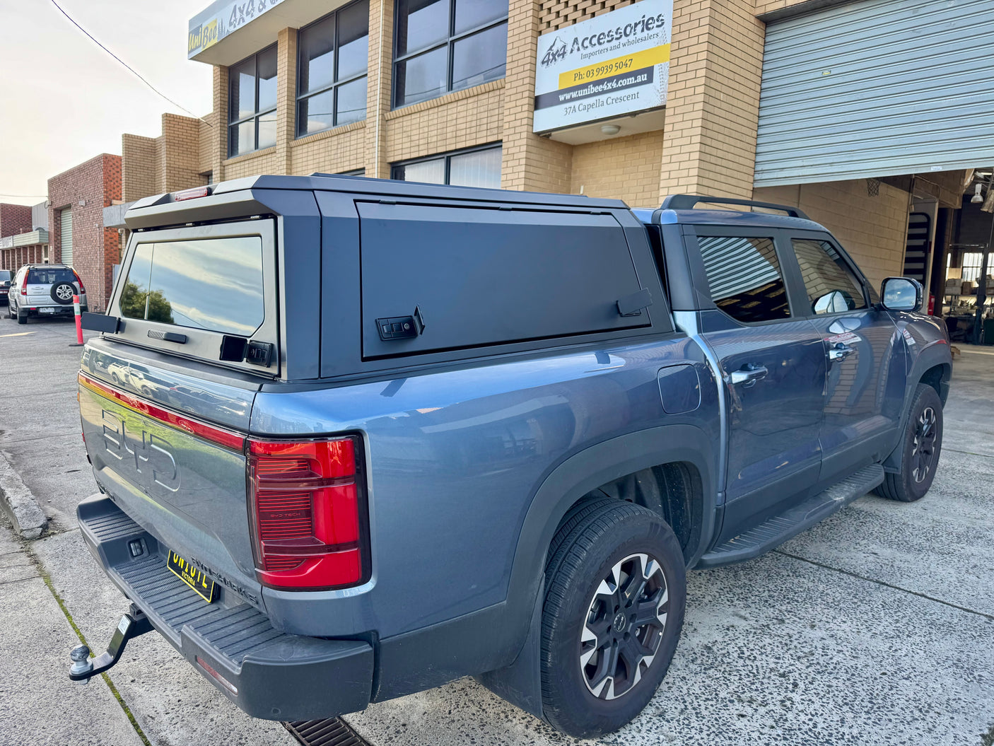 BYD Shark 6 2025+ stainless steel canopy — rear three-quarter view showing the hatch and finish