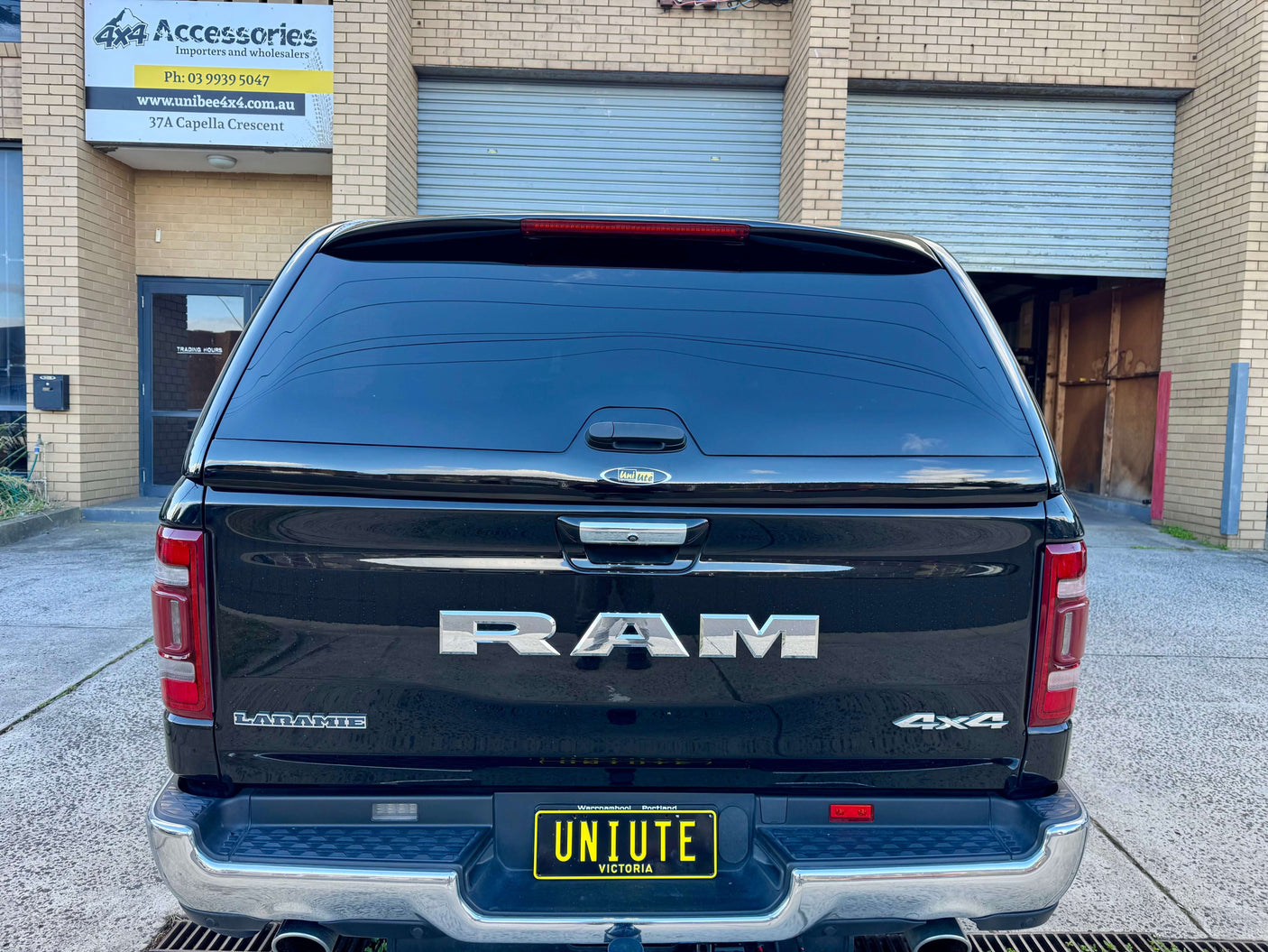 RAM 1500 canopy shown at 4x4 accessories store.