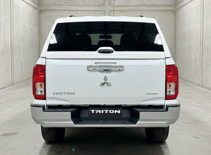 Rear view of Triton Canopy Mitsubishi MV 2024+ FORCE PRO, showcasing its fit and finish, designed for durability and adventure.