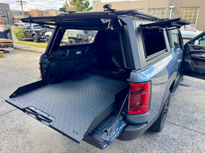 Sliding Tray for BYD Shark 6 mounted on an open truck, showcasing cargo accessibility for 2025+ plug-in hybrid ute by UniUte.