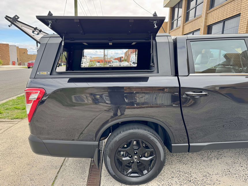 KGM Musso Canopy XLV Stainless Steel Ute Canopy for 2018-2025 model displayed in open position