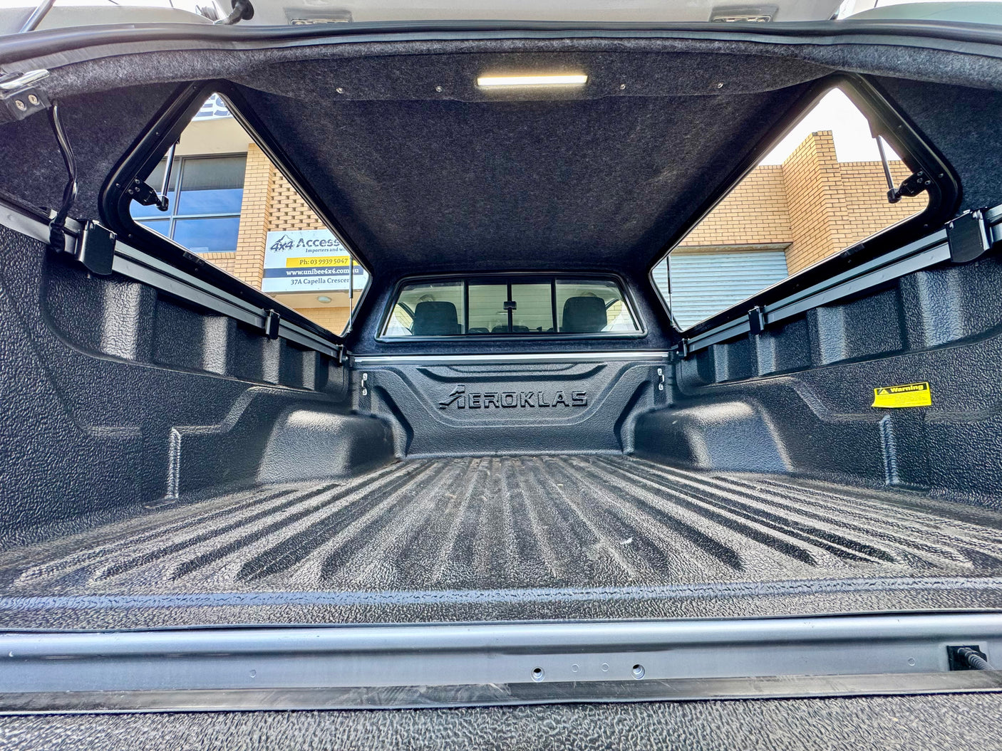 Mazda BT-50 canopy — close-up of the paint-matched finish and roof rail