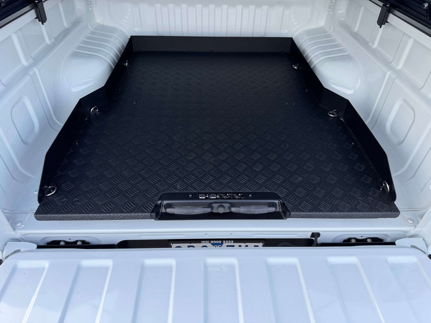 Ute tray slide for Isuzu D-Max 2012-2025 truck bed, enhancing storage and functionality.