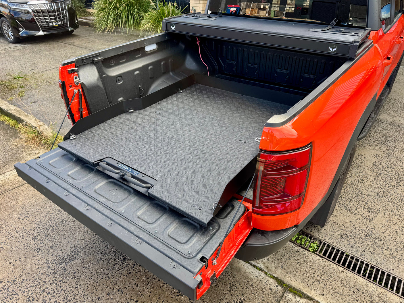 Sliding Tray for BYD Shark 6 in open tailgate position, enhancing cargo access for Australia's first PHEV ute.