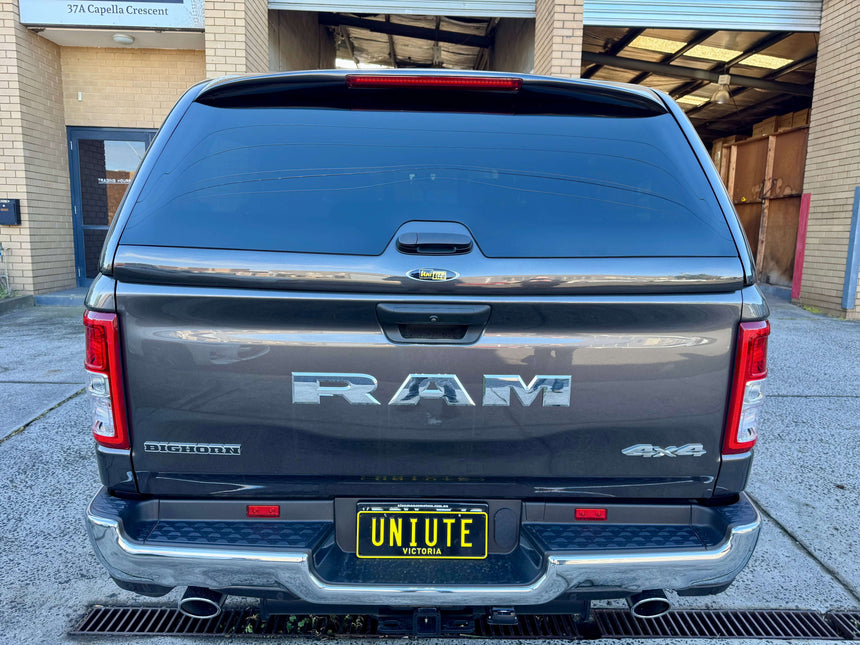 Rear view of RAM 1500 canopy, tailored for ram 1500 canopy owners in Australia, 2020–2025 models shown in outdoor setting.