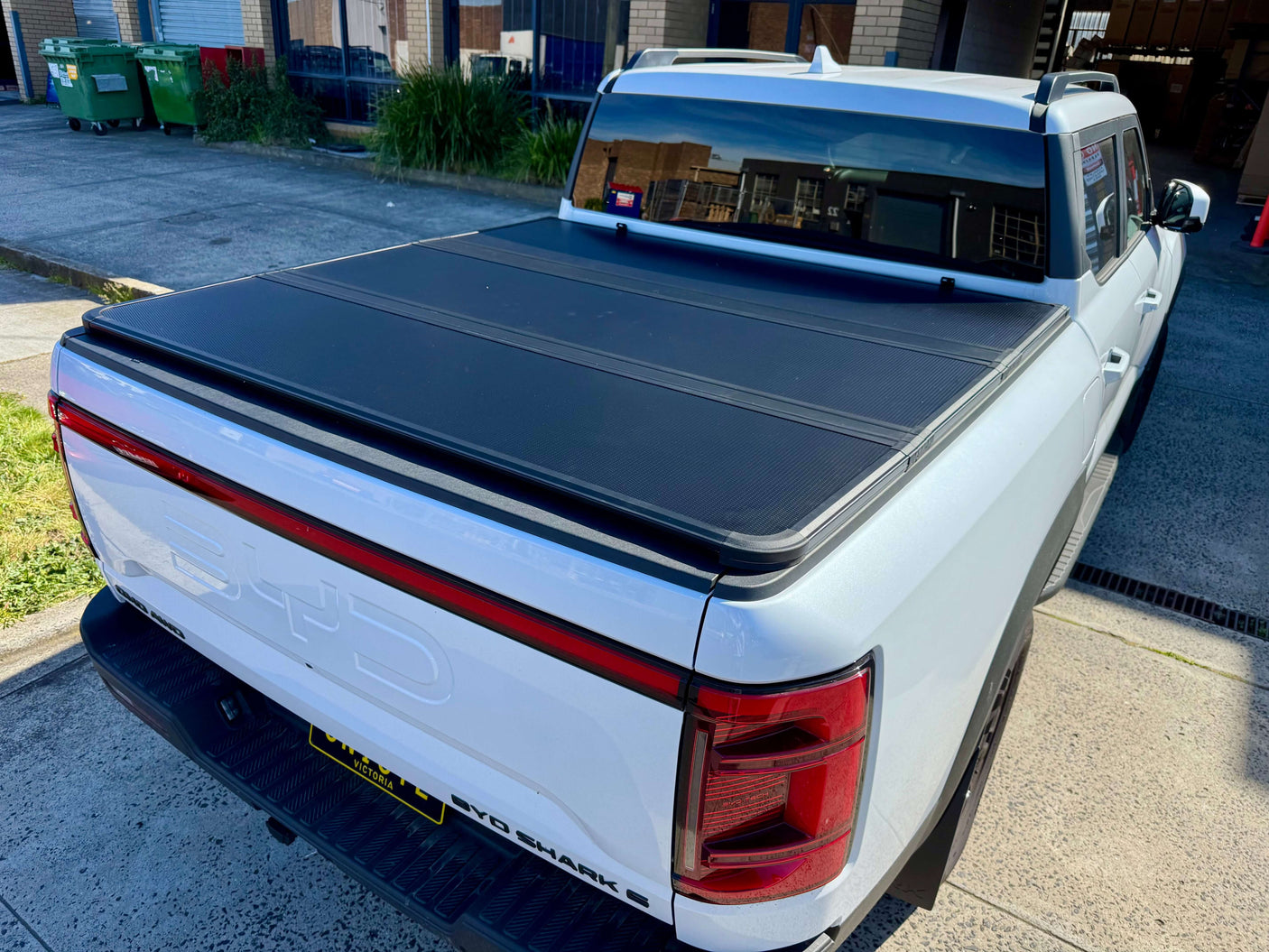 BYD Shark 6 hard lid with tri-fold tonneau cover for 2025+ models, providing style and security for your vehicle's cargo.