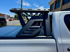 Universal roll bar with multifunction rack — front view showing rack system
