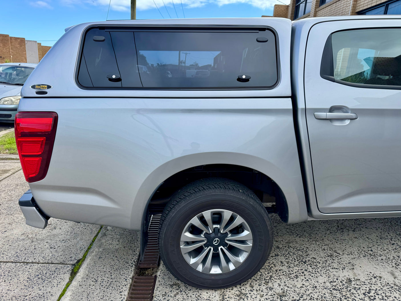 Mazda BT-50 fibreglass canopy — rear door open showing interior tub storage