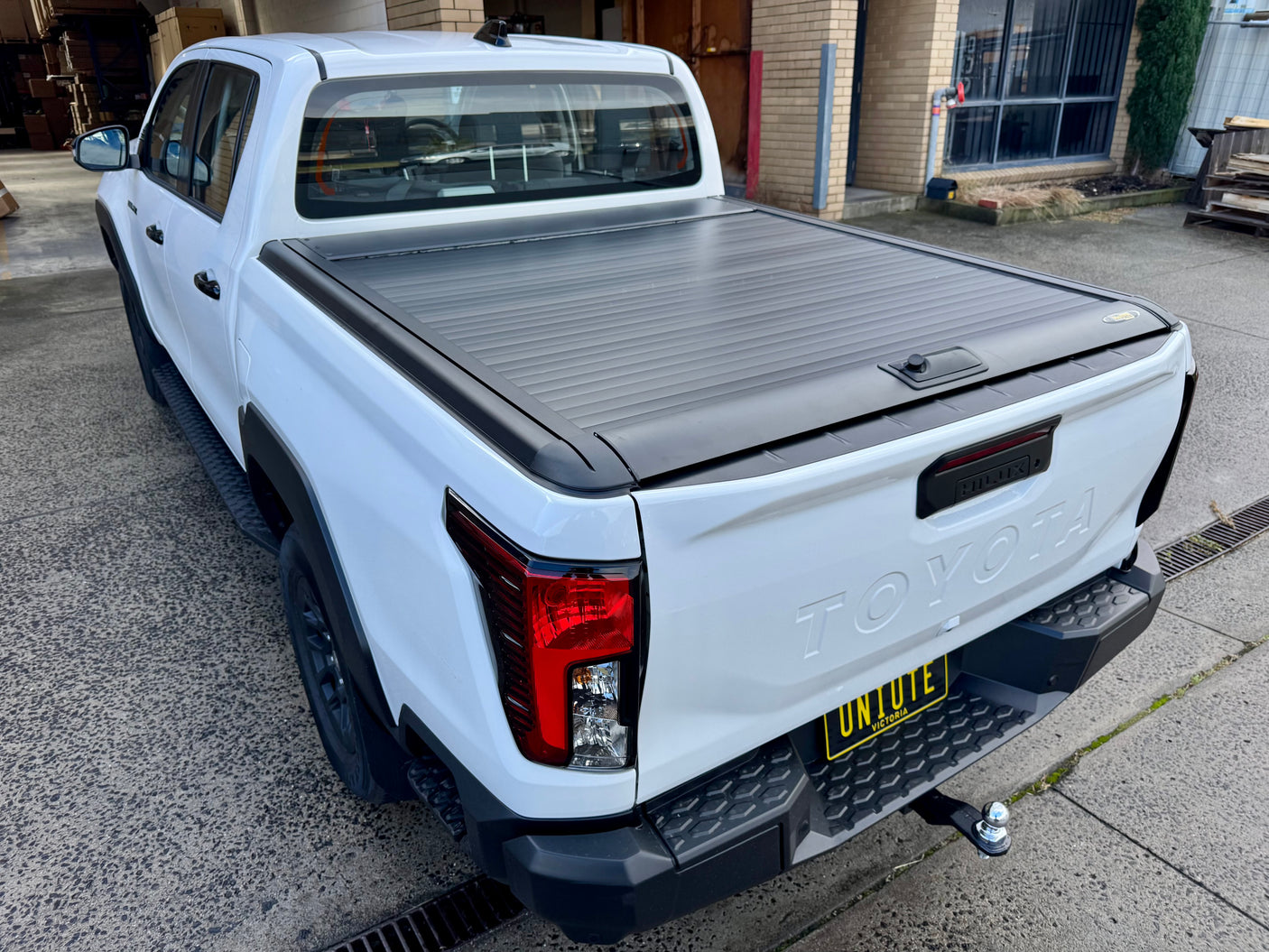 Hilux N90 roller shutter — side profile showing low-profile slat design on 2026+ model