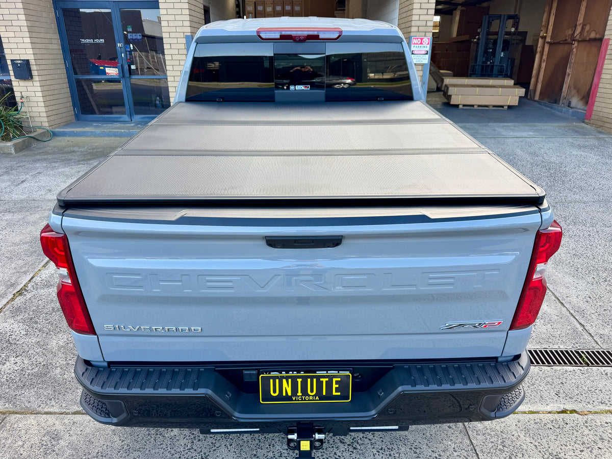 Chevrolet Silverado 1500 tri-fold hard lid — side view showing panel fit