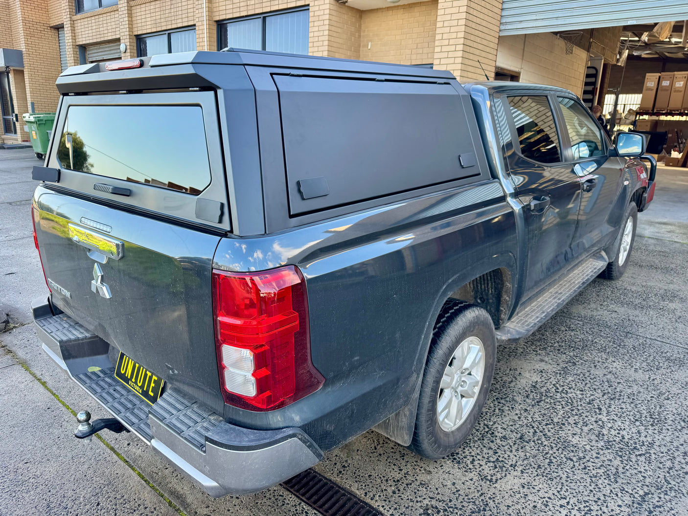 Stainless steel canopy for Mitsubishi Triton MV 2024+ — installed on ute showing full profile | UniUte