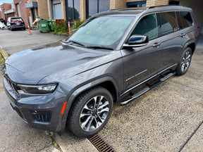 Black side bars for Jeep Grand Cherokee WL L 2022-2025 — installed full side view | UniUte