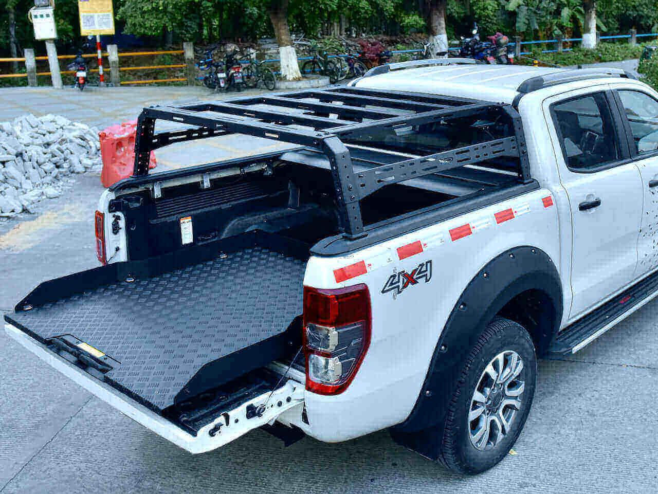Mitsubishi Triton 2009-2025 with UniUte slide tray for ute extended, enhancing storage and accessibility.