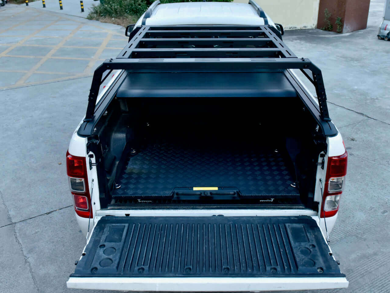 Cargo tray in Jeep Gladiator 2020-2025 with sliding tray drawer for enhanced storage.
