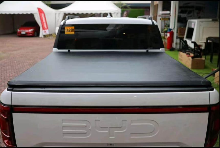 BYD Shark 6 with UniUte Tri-Fold Soft Tonneau Cover for 2025+, showcasing sleek design and weather protection. byd shark 6 tonneau cover
