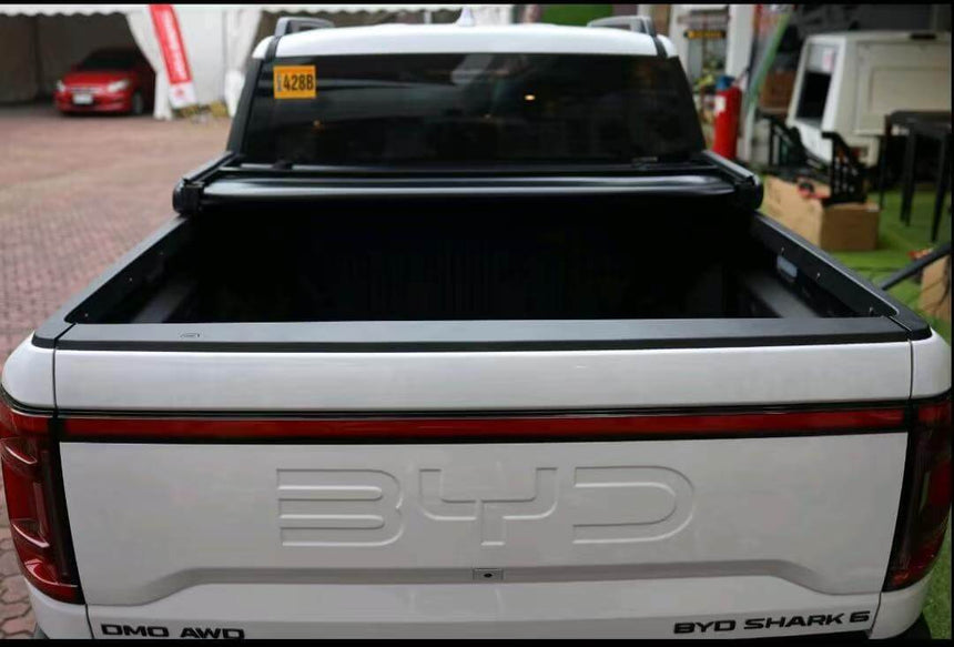 BYD Shark 6 Tonneau Cover for 2025+ showcasing open truck bed, perfect for weather protection.