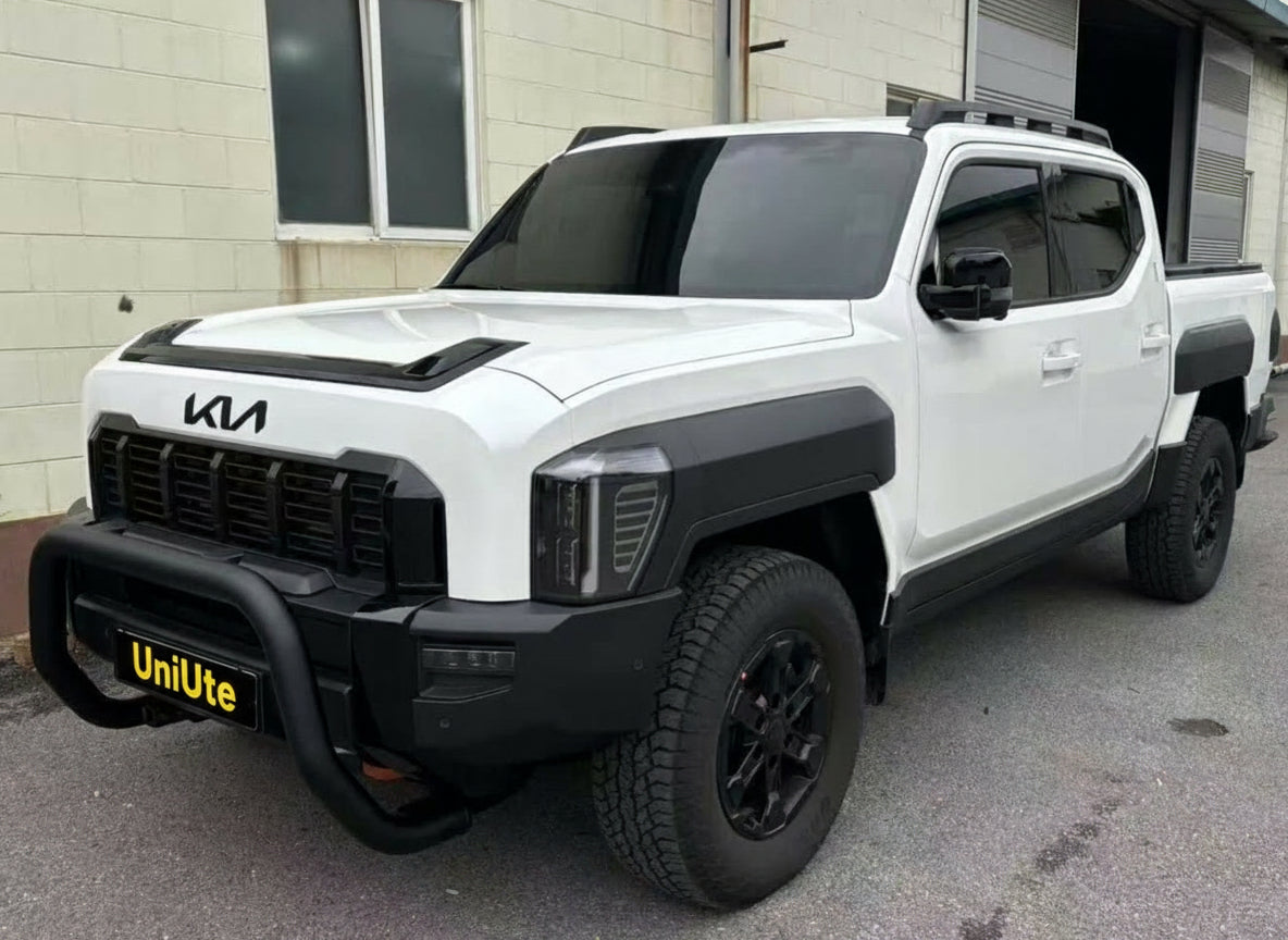 White KIA Tasman with UniUte Kia Tasman nudge bar for rugged protection and bold style.