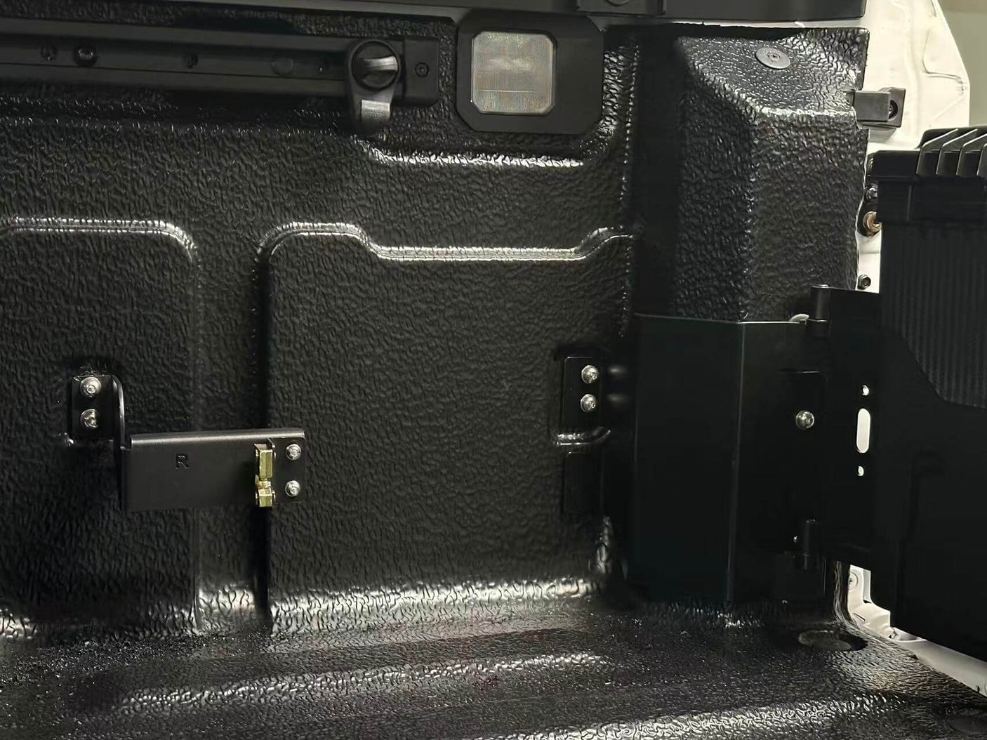 Interior view of Ford F150 tool box installed in truck bed, showcasing smart swing-out storage for 2015-2025 models.